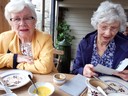 Members enjoying tea and scones in the Old Yard, Castledermot 